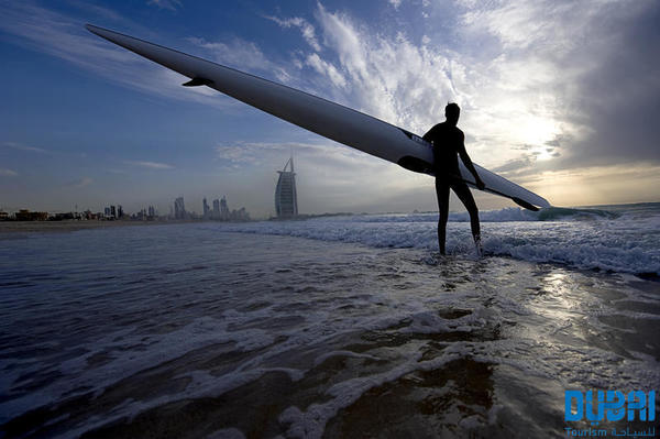 AEDXB - Dubai - Surfer on the Beach - Credit Dubai Department of Tourism and Commerce Marketing.jpg